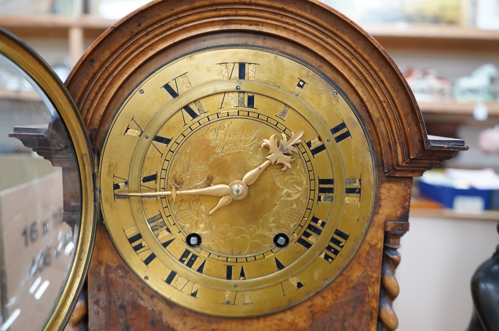 A 19th century French walnut bracket clock, the engraved brass dial signed Planchson Palais Royale, 20ins